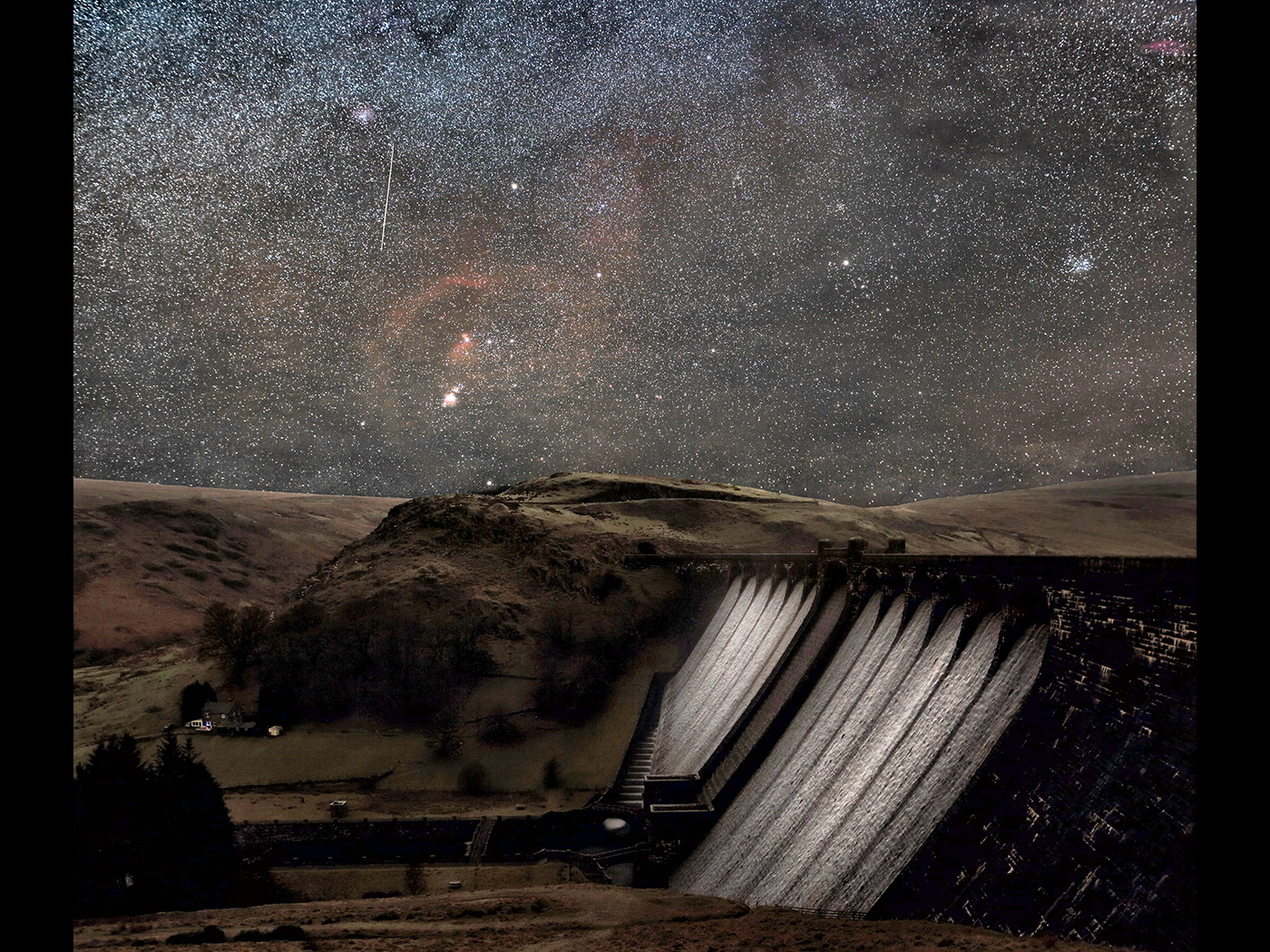Orion over a cascading Claerwen Dam  By David Tolliday