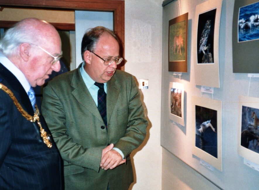 Past Club President Ian Morison conducting the Mayor of Macclesfield, Norman Edwards